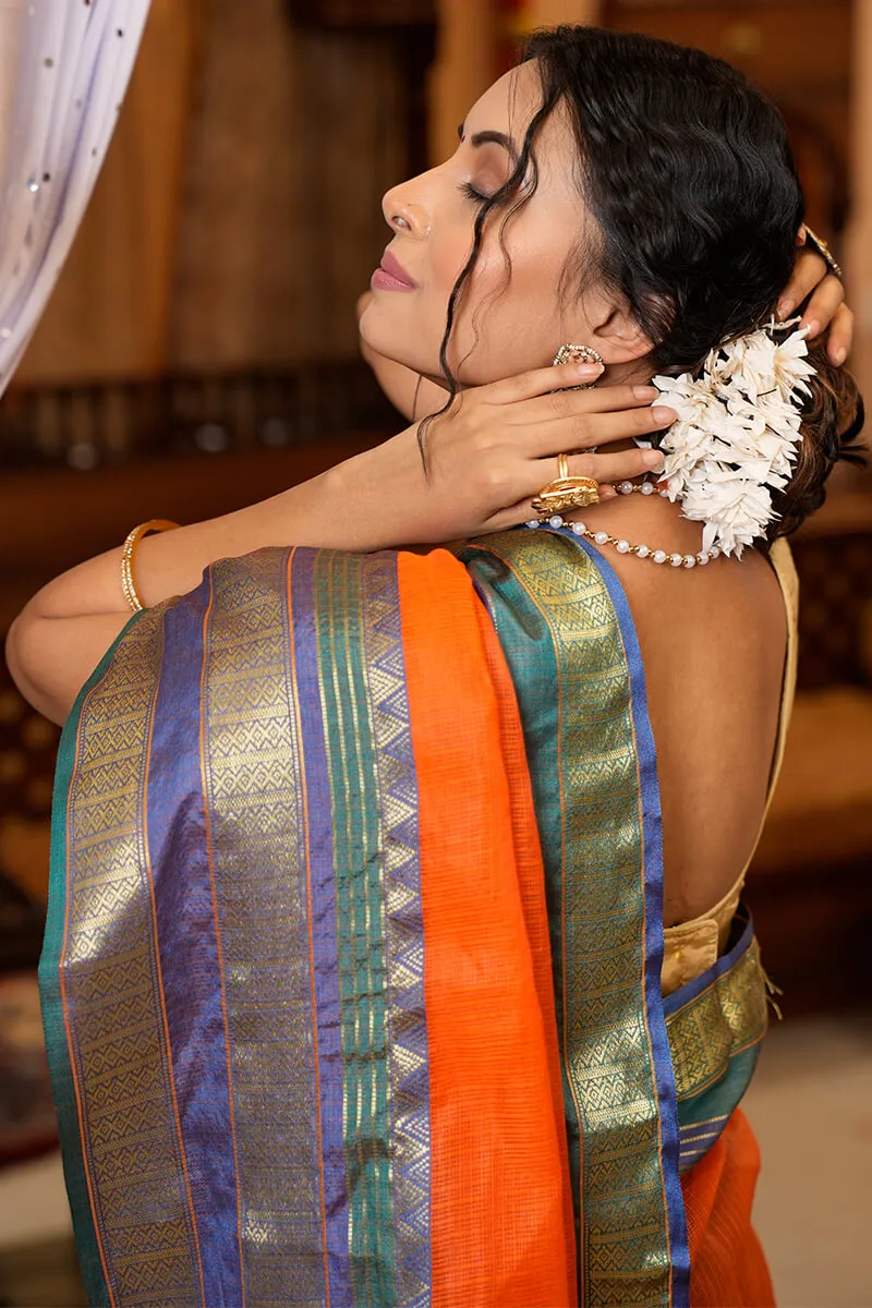 Cynosure Orange Soft Silk Saree With Demesne Blouse Piece