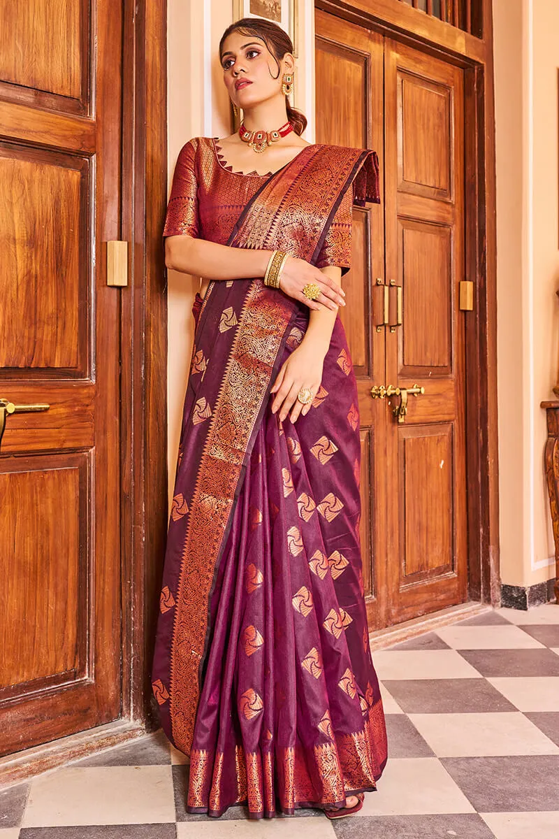 Cynosure Purple Soft Banarasi Silk Saree With Brood Blouse Piece