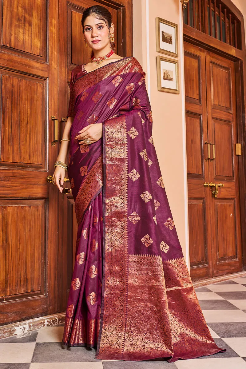 Cynosure Purple Soft Banarasi Silk Saree With Brood Blouse Piece