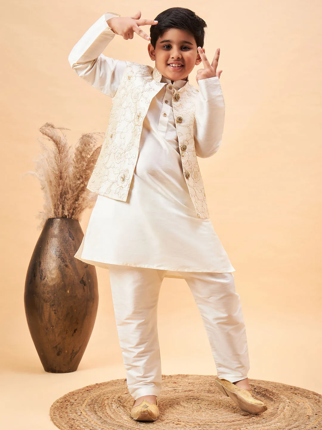 Vastramay Boy's Beige Nehru Jacket With Cream Kurta And Pyjama Set