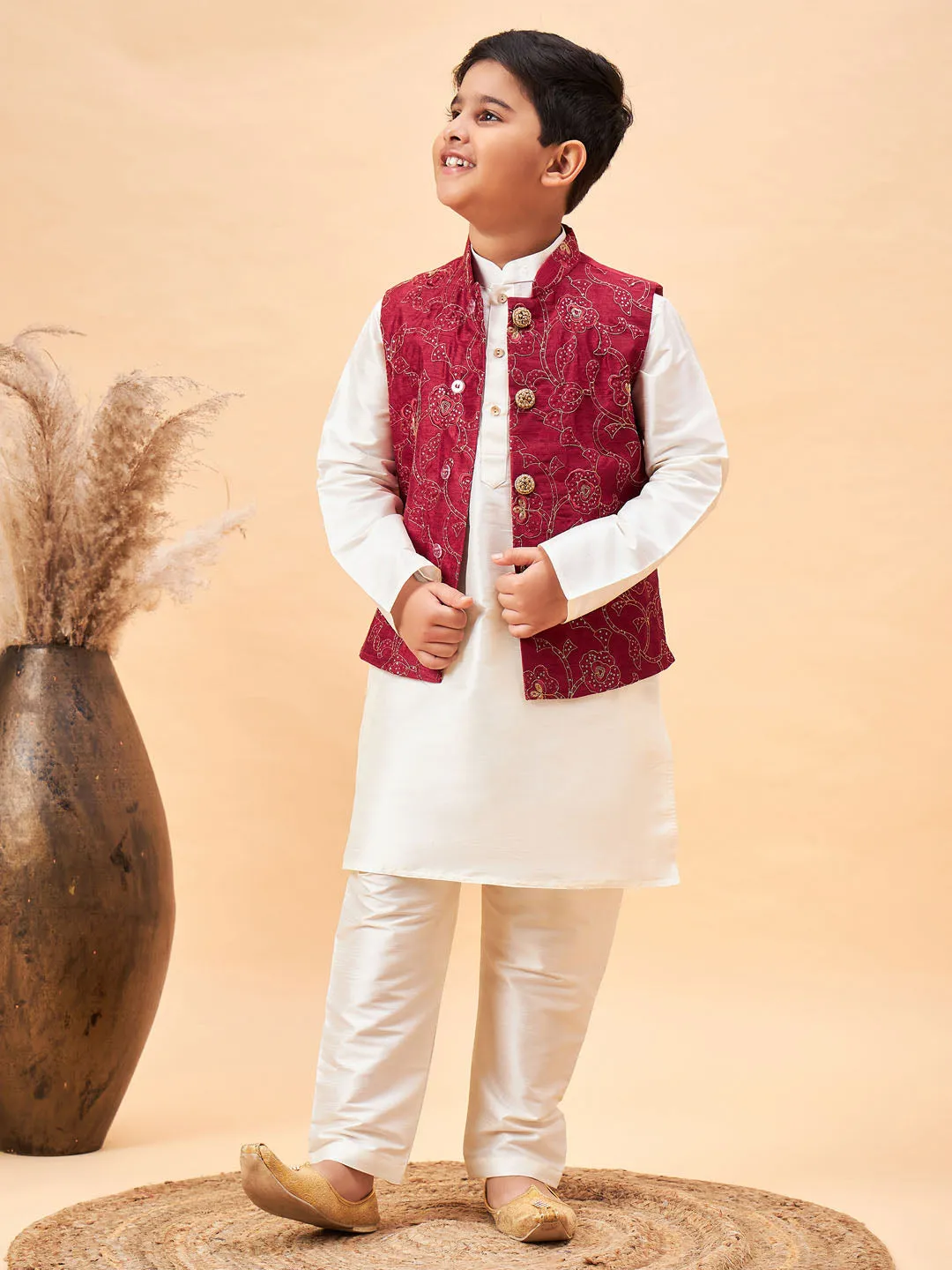 VASTRAMAY Boy's Maroon Nehru Jacket With Cream Kurta And Pyjama Set